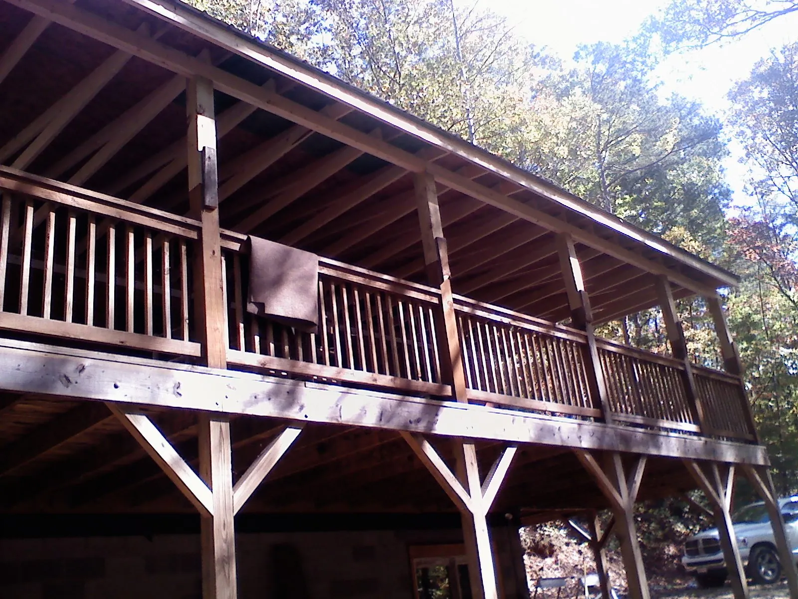 Timber framing under a new elevated porch and deck — Roof Leak Repair in Jamestown by Roofing Brothers